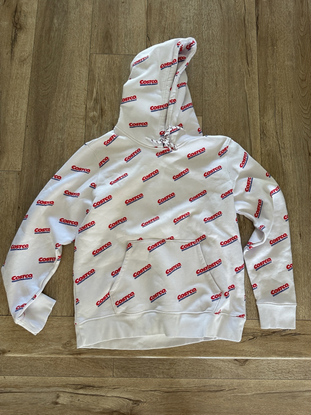 Kirkland Signature Costco White Hoodie with Red and Blue Logo Print
